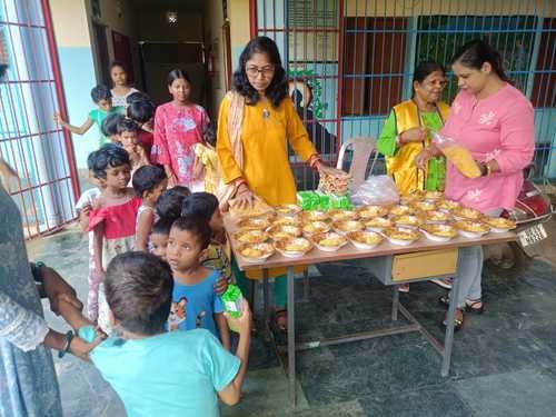 Serving Snacks in a children's Home by LCB Gemini
